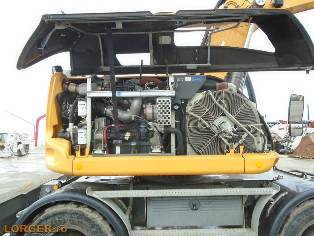 Ratastel ekskavaator Liebherr A 914: pilt 8