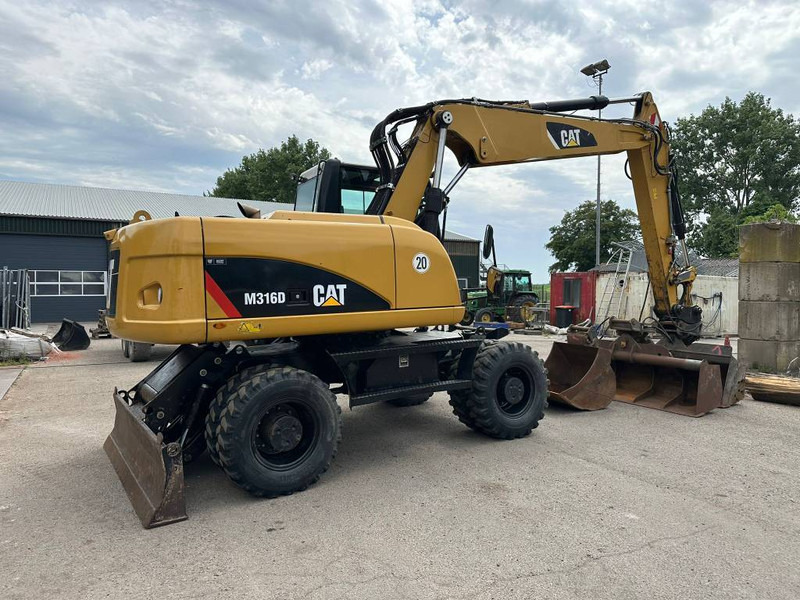 Ratastel ekskavaator Cat M 316 D: pilt 6