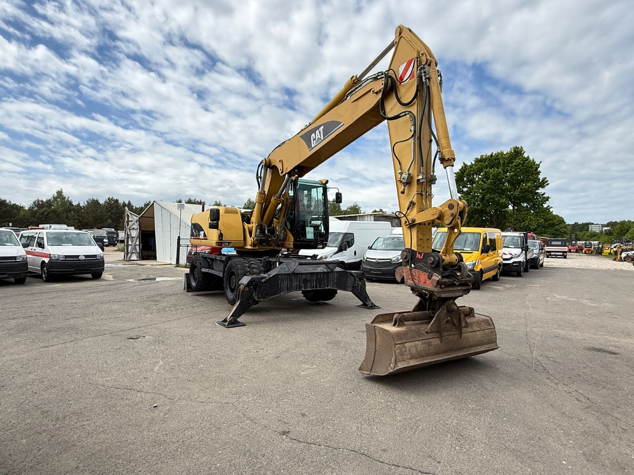 CAT M 322C - Ratastel ekskavaator: pilt 1 CAT M 322C - Ratastel ekskavaator: pilt 1