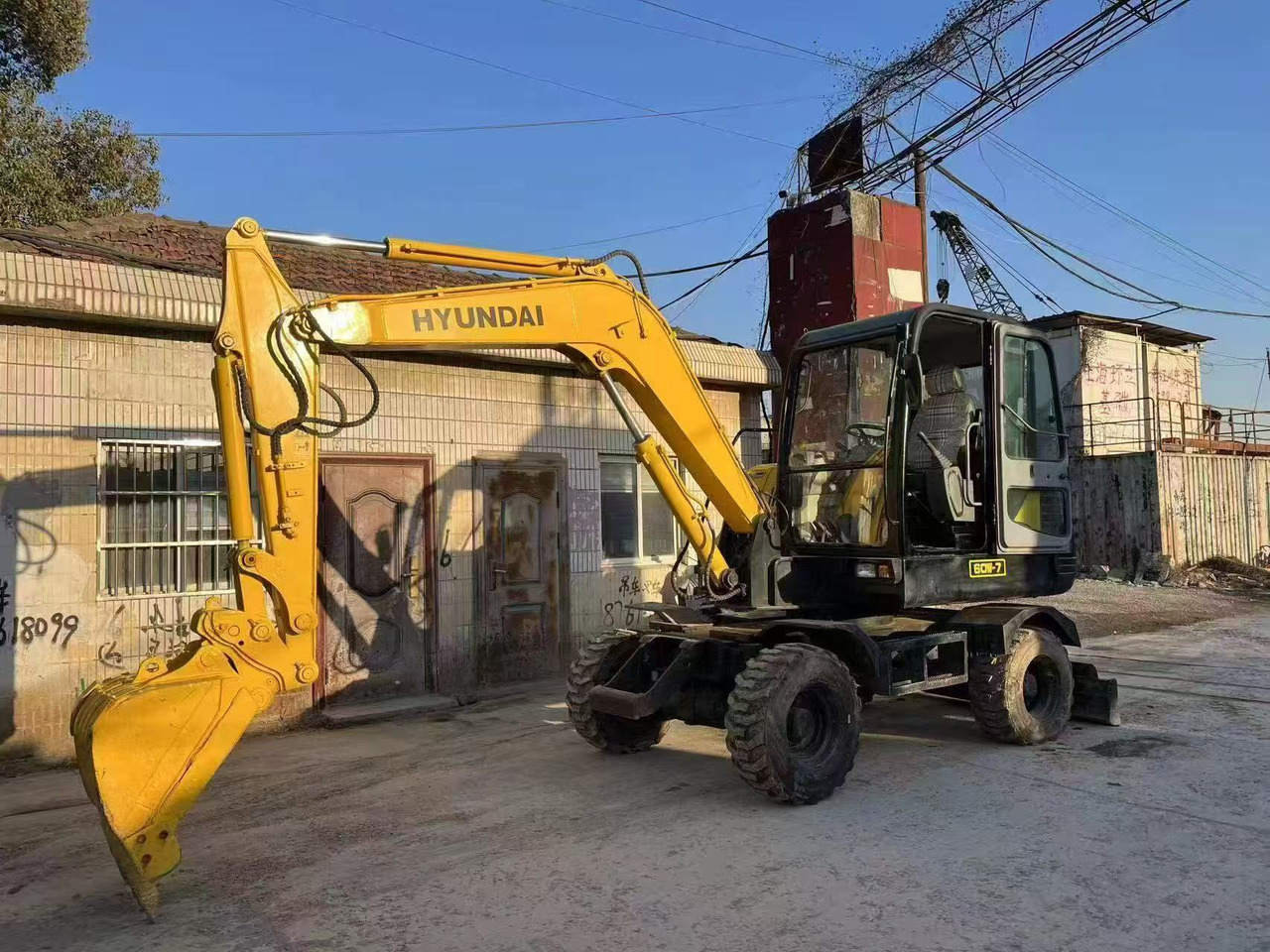 Hyundai 60w-7 - Ratastel ekskavaator: pilt 1 Hyundai 60w-7 - Ratastel ekskavaator: pilt 1