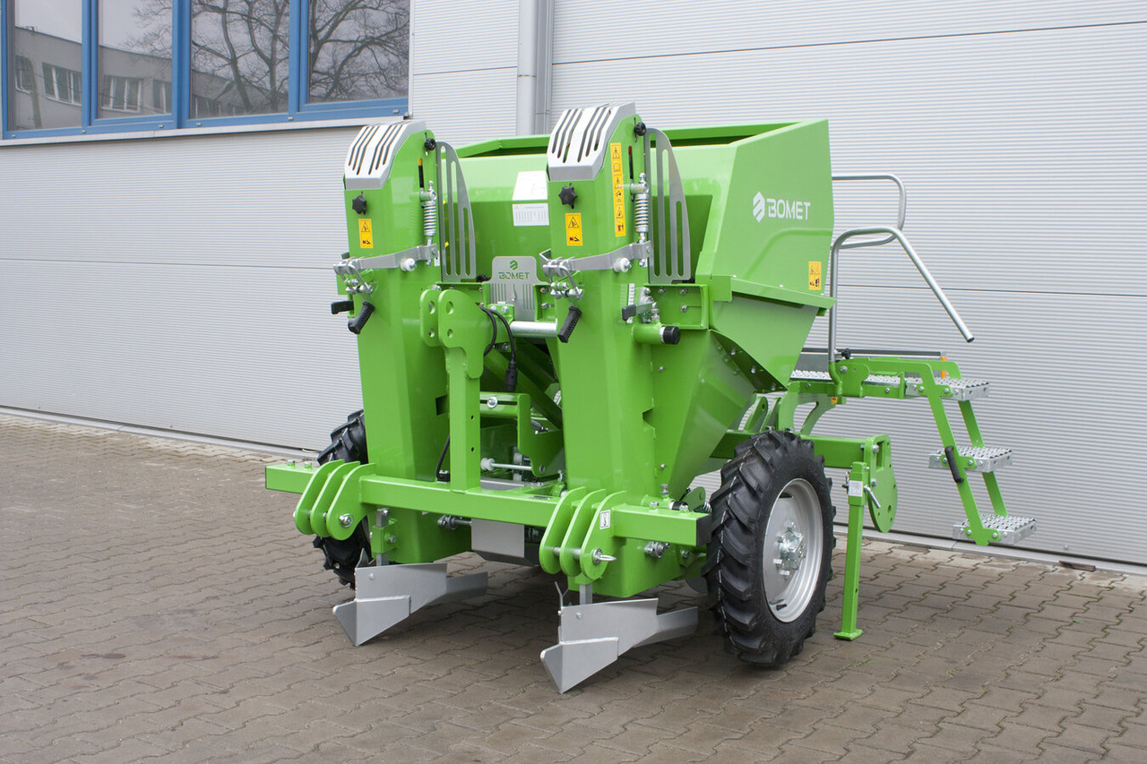 Bomet Kartoffelpflanzmaschine / Potato planter / Planteuse de pomme de terre / Piantapatate / Sadzarka ziemniaków - Kartulipanija: pilt 1 Bomet Kartoffelpflanzmaschine / Potato planter / Planteuse de pomme de terre / Piantapatate / Sadzarka ziemniaków - Kartulipanija: pilt 1
