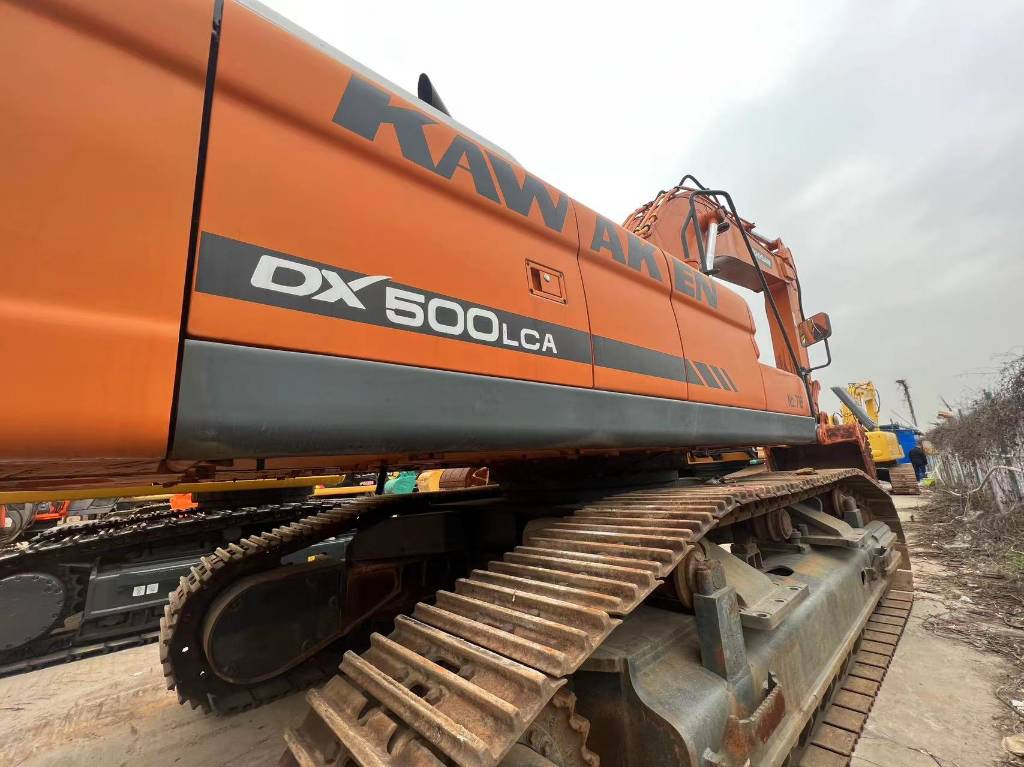 Doosan DX 500 LCA - Lintekskavaator: pilt 1 Doosan DX 500 LCA - Lintekskavaator: pilt 1