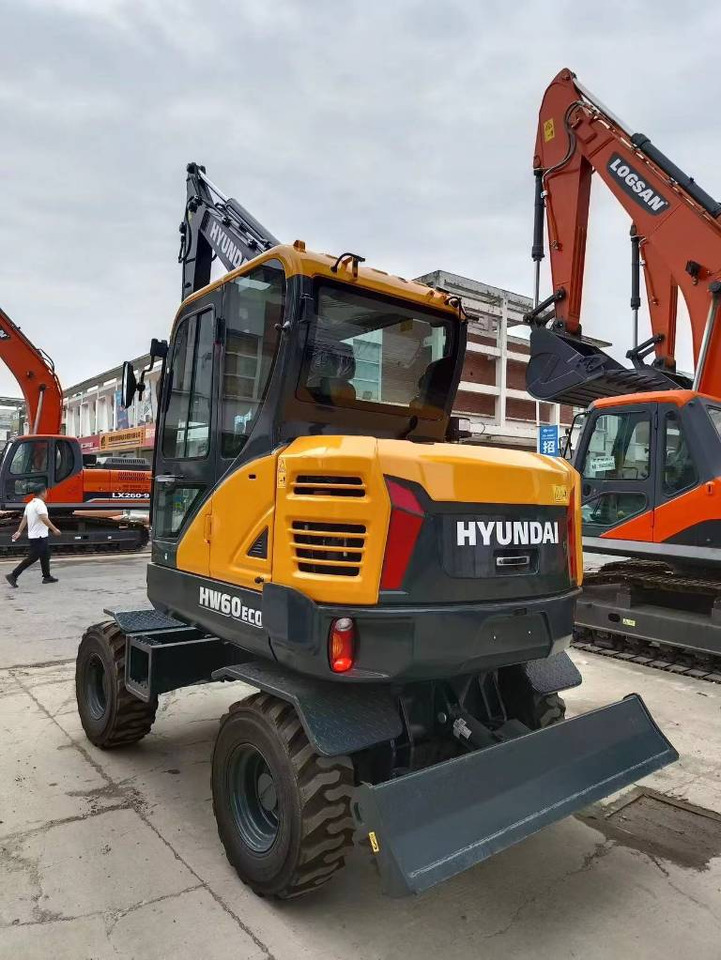 Hyundai 100% new Hyundai HW60ECO - Ratastel ekskavaator: pilt 1 Hyundai 100% new Hyundai HW60ECO - Ratastel ekskavaator: pilt 1