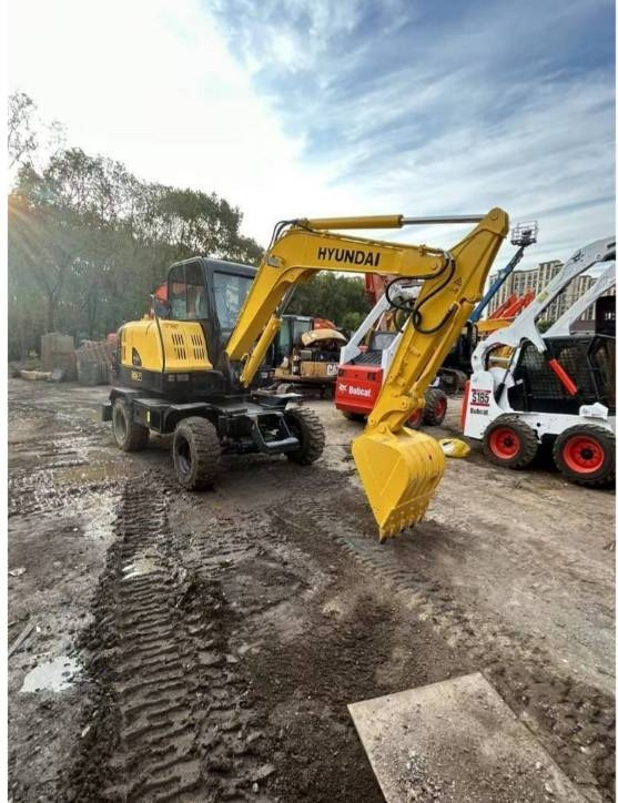 Hyundai 60W-7 - Ratastel ekskavaator: pilt 1 Hyundai 60W-7 - Ratastel ekskavaator: pilt 1