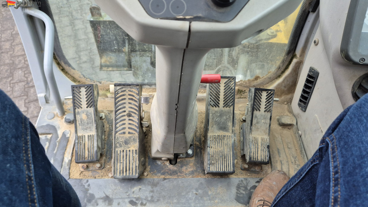 New Holland MH 2.6 Zustand gut, deutsche Maschine incl. Greifer und Dreservo - Ratastel ekskavaator: pilt 5 New Holland MH 2.6 Zustand gut, deutsche Maschine incl. Greifer und Dreservo - Ratastel ekskavaator: pilt 5