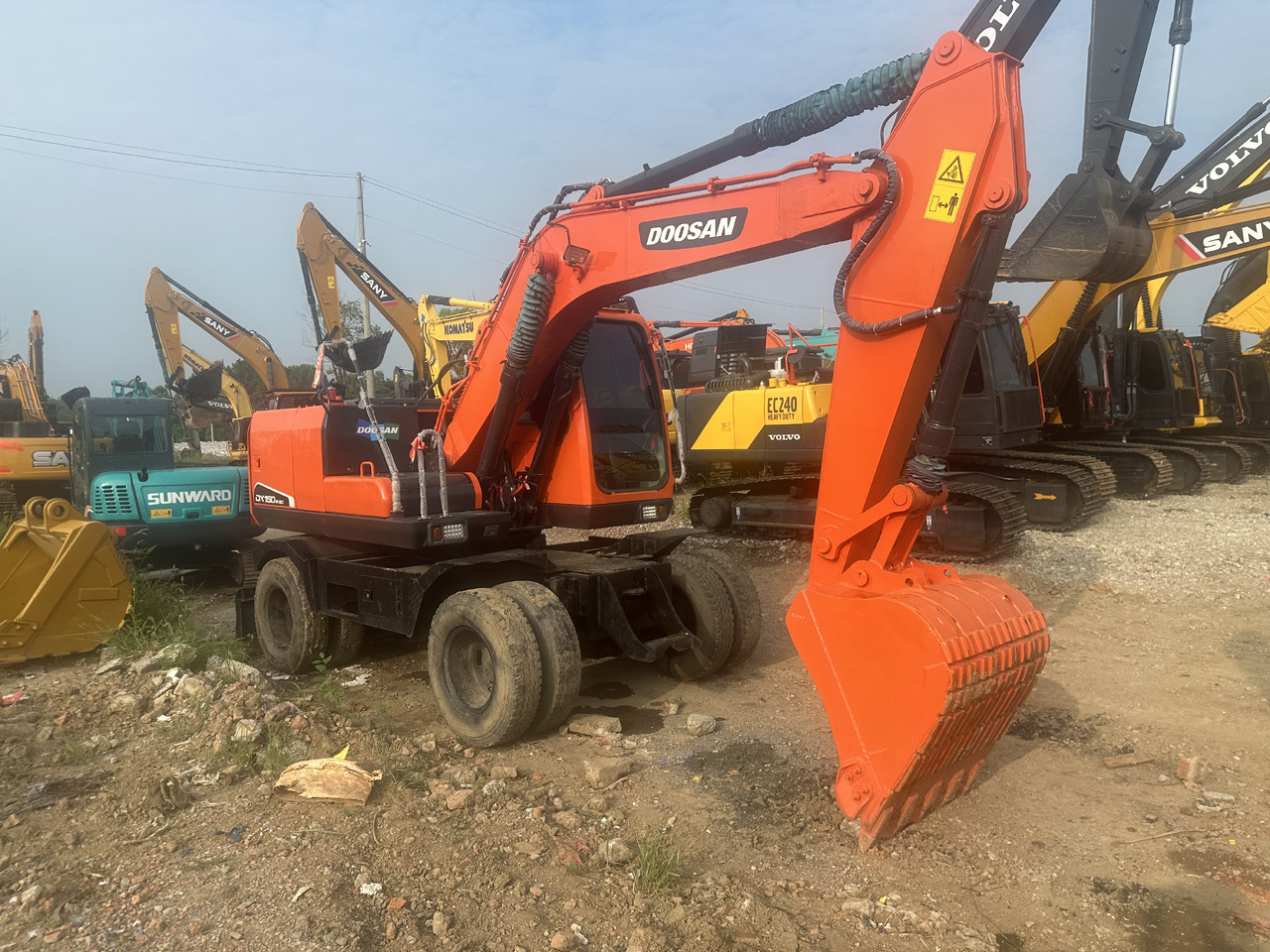 Doosan DX150W-9C - Ratastel ekskavaator: pilt 2 Doosan DX150W-9C - Ratastel ekskavaator: pilt 2