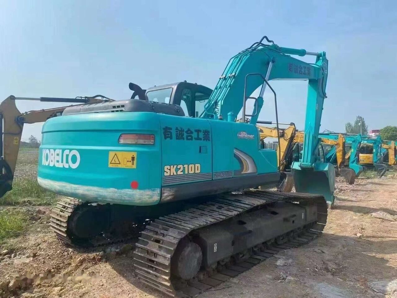 Kobelco SK210D - Lintekskavaator: pilt 2 Kobelco SK210D - Lintekskavaator: pilt 2