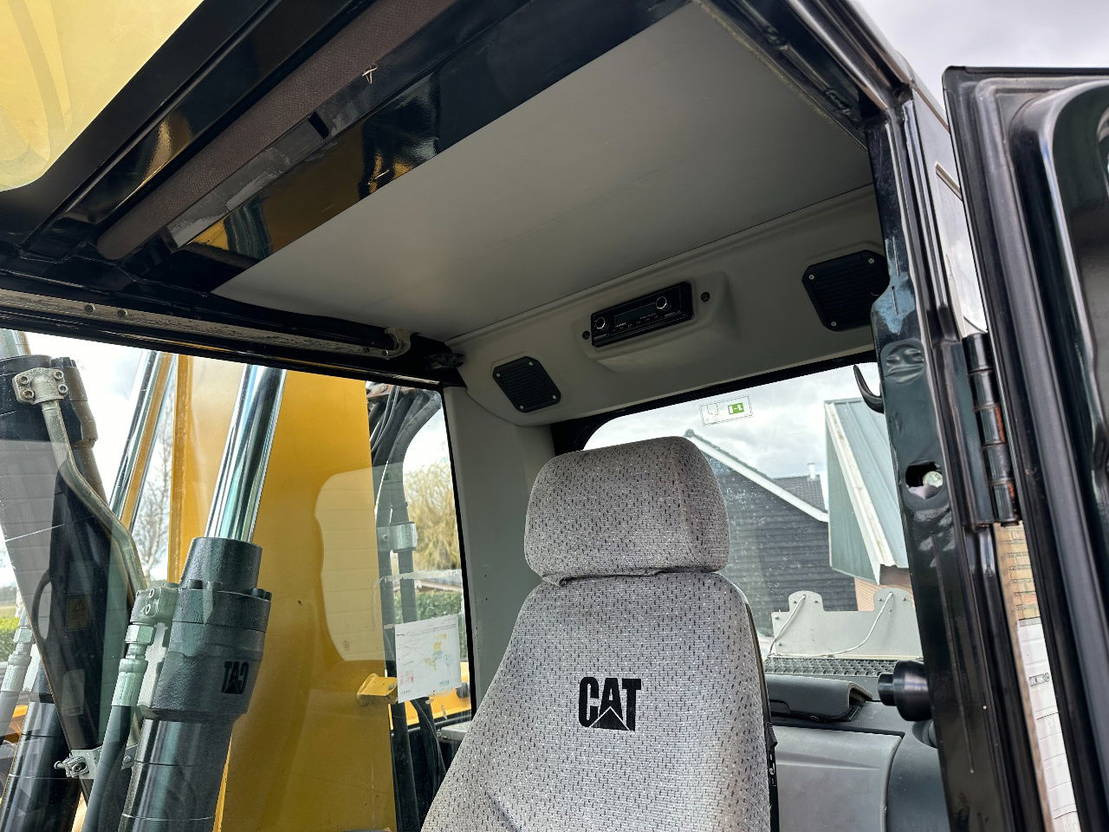 Ratastel ekskavaator Caterpillar M313D: pilt 11