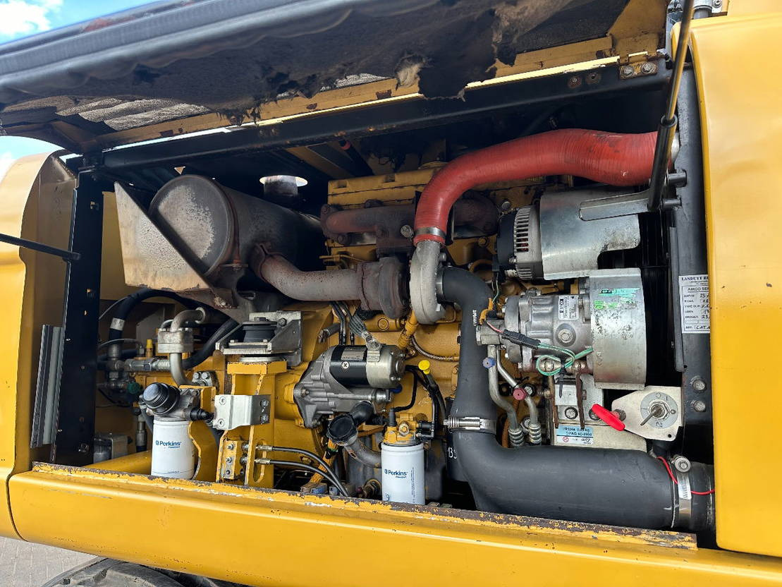 Ratastel ekskavaator Caterpillar M313D: pilt 17