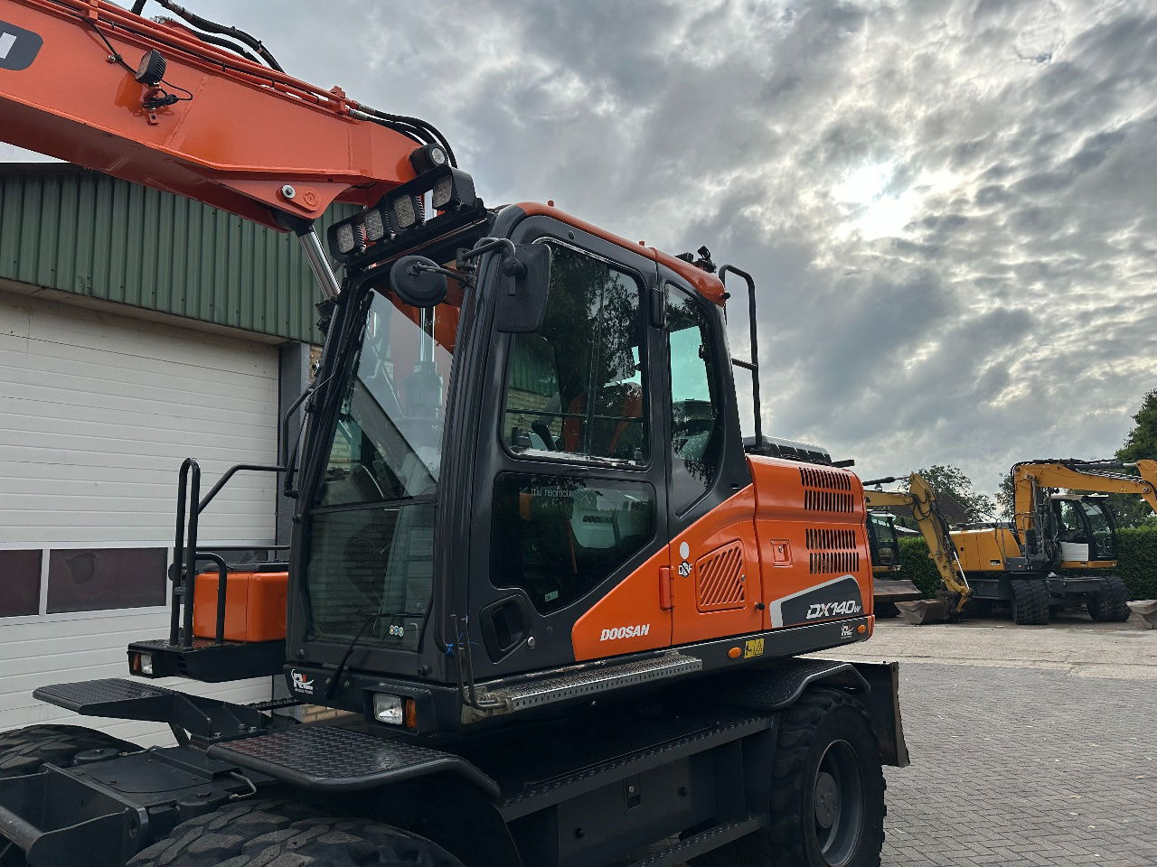 Doosan DX140W-5 - Ratastel ekskavaator: pilt 3 Doosan DX140W-5 - Ratastel ekskavaator: pilt 3