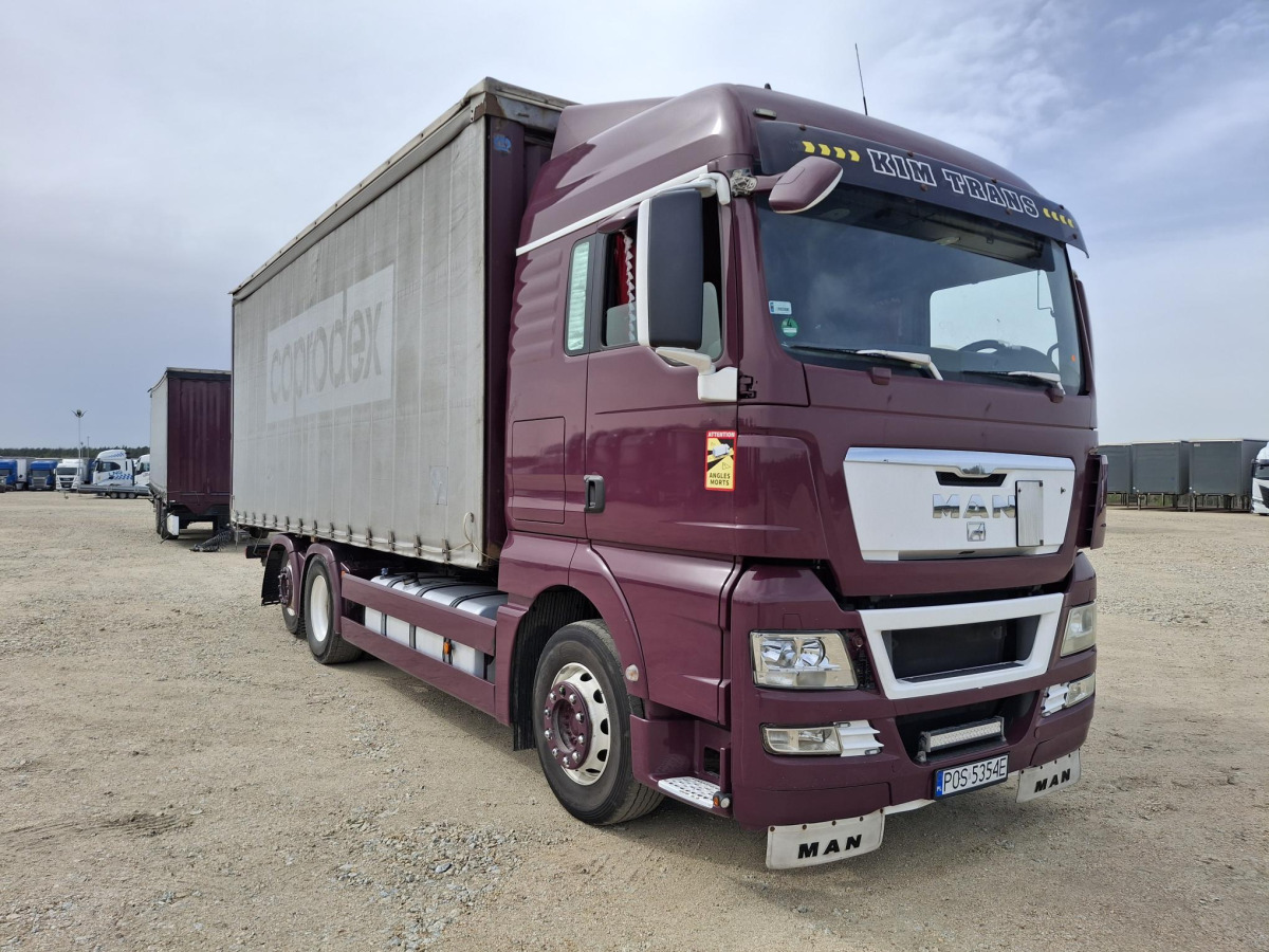 MAN TGX 26.440 SOLÓWKA + PRZYCZEPA KRONE - Tent veoauto: pilt 1 MAN TGX 26.440 SOLÓWKA + PRZYCZEPA KRONE - Tent veoauto: pilt 1