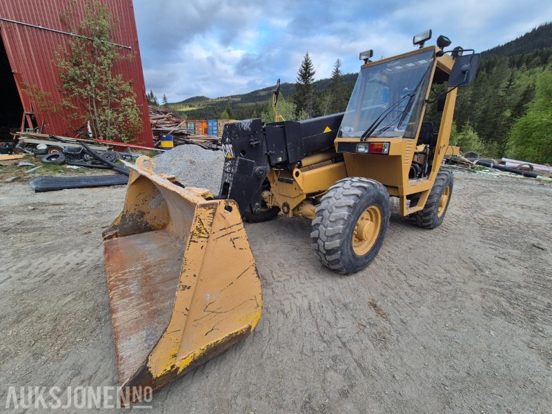 1991 Cat RTC60 teleskoptruck, 4WD, skuffe / personkorg - Teleskooplaadur: pilt 2 1991 Cat RTC60 teleskoptruck, 4WD, skuffe / personkorg - Teleskooplaadur: pilt 2
