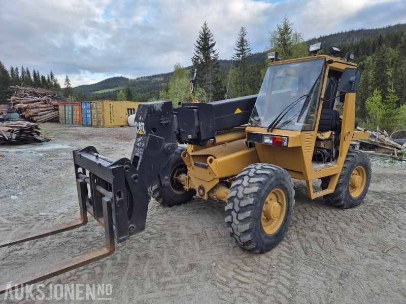 1991 Cat RTC60 teleskoptruck, 4WD, skuffe / personkorg - Teleskooplaadur: pilt 1 1991 Cat RTC60 teleskoptruck, 4WD, skuffe / personkorg - Teleskooplaadur: pilt 1