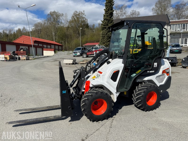2022 Bobcat L23 kompaktlaster med skuffe, gafler og hydraulisksnøskjær - Kompaktlaadur: pilt 1 2022 Bobcat L23 kompaktlaster med skuffe, gafler og hydraulisksnøskjær - Kompaktlaadur: pilt 1