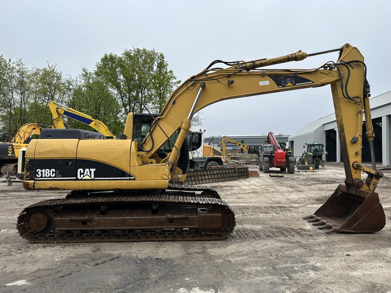 Caterpillar 318 CL Good undercarriage (not 320CL - 325CL) - Lintekskavaator: pilt 4 Caterpillar 318 CL Good undercarriage (not 320CL - 325CL) - Lintekskavaator: pilt 4