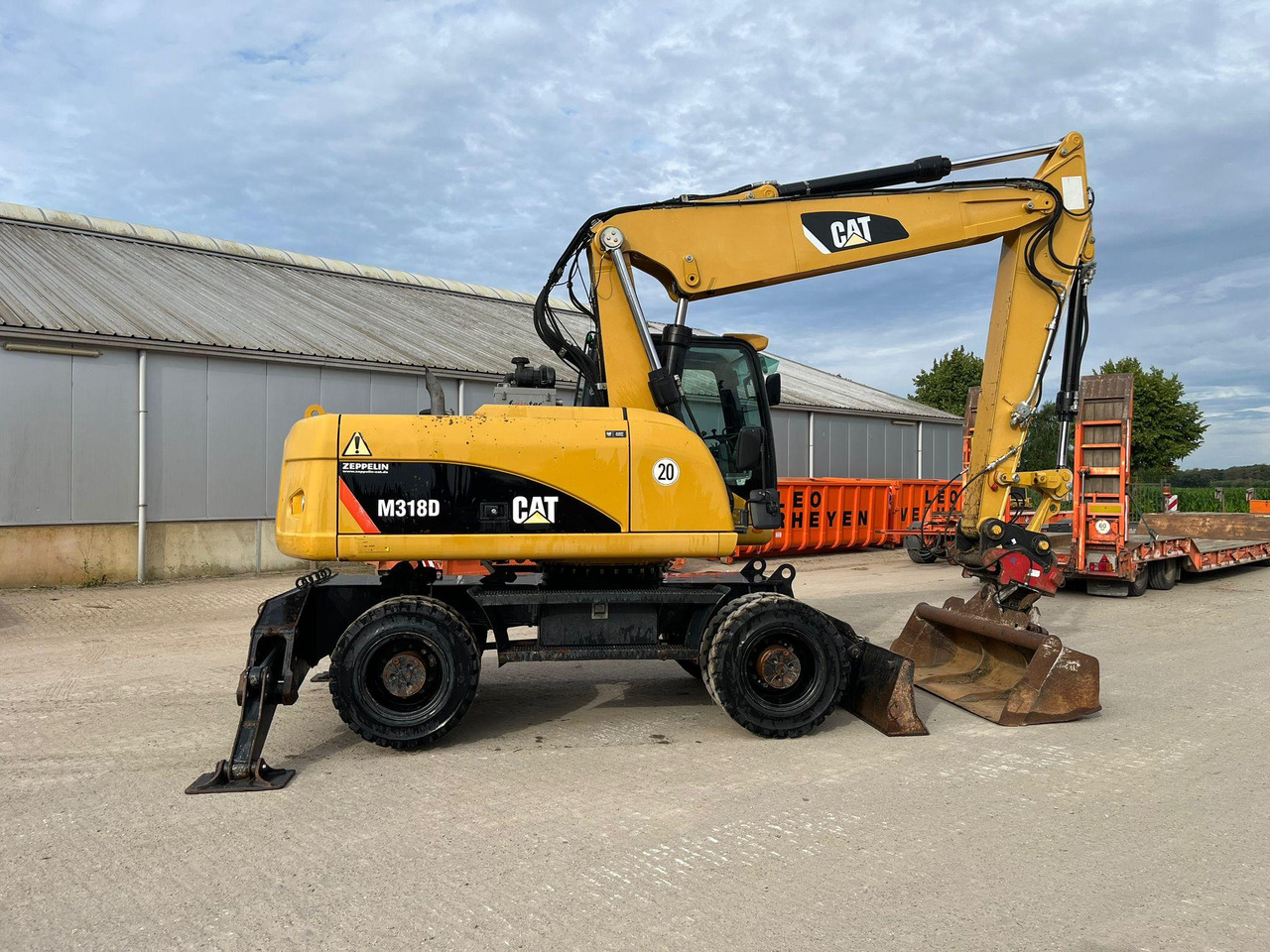 Caterpillar M318D - Ratastel ekskavaator: pilt 2 Caterpillar M318D - Ratastel ekskavaator: pilt 2
