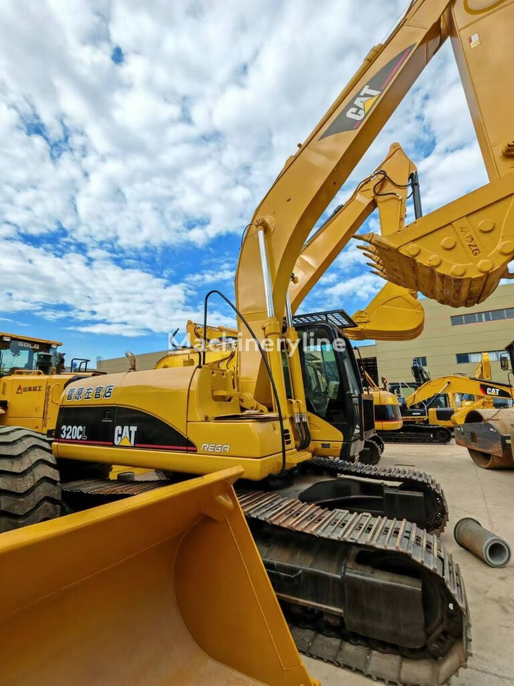Caterpillar 320CL - Ratastel ekskavaator: pilt 2 Caterpillar 320CL - Ratastel ekskavaator: pilt 2