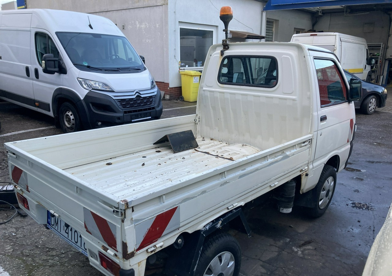 Inna Inny PFAU Piaggio Porter 4X4 Skrzynia odśnieżarka Pług 5655km 2012 - Madelauto: pilt 4 Inna Inny PFAU Piaggio Porter 4X4 Skrzynia odśnieżarka Pług 5655km 2012 - Madelauto: pilt 4