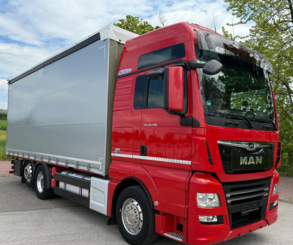 MAN TGX 26.500 / LIFT / 6X2 / KLIMA POSTOJOWA / 18PALET / E6 / FIRANKA / 18 TON ŁADOWNOŚĆ / WINDA / NISKI PRZEBIEG / JEDEN WŁAŚCICIEL / PODWIESZANA OŚ - Tent veoauto: pilt 2 MAN TGX 26.500 / LIFT / 6X2 / KLIMA POSTOJOWA / 18PALET / E6 / FIRANKA / 18 TON ŁADOWNOŚĆ / WINDA / NISKI PRZEBIEG / JEDEN WŁAŚCICIEL / PODWIESZANA OŚ - Tent veoauto: pilt 2