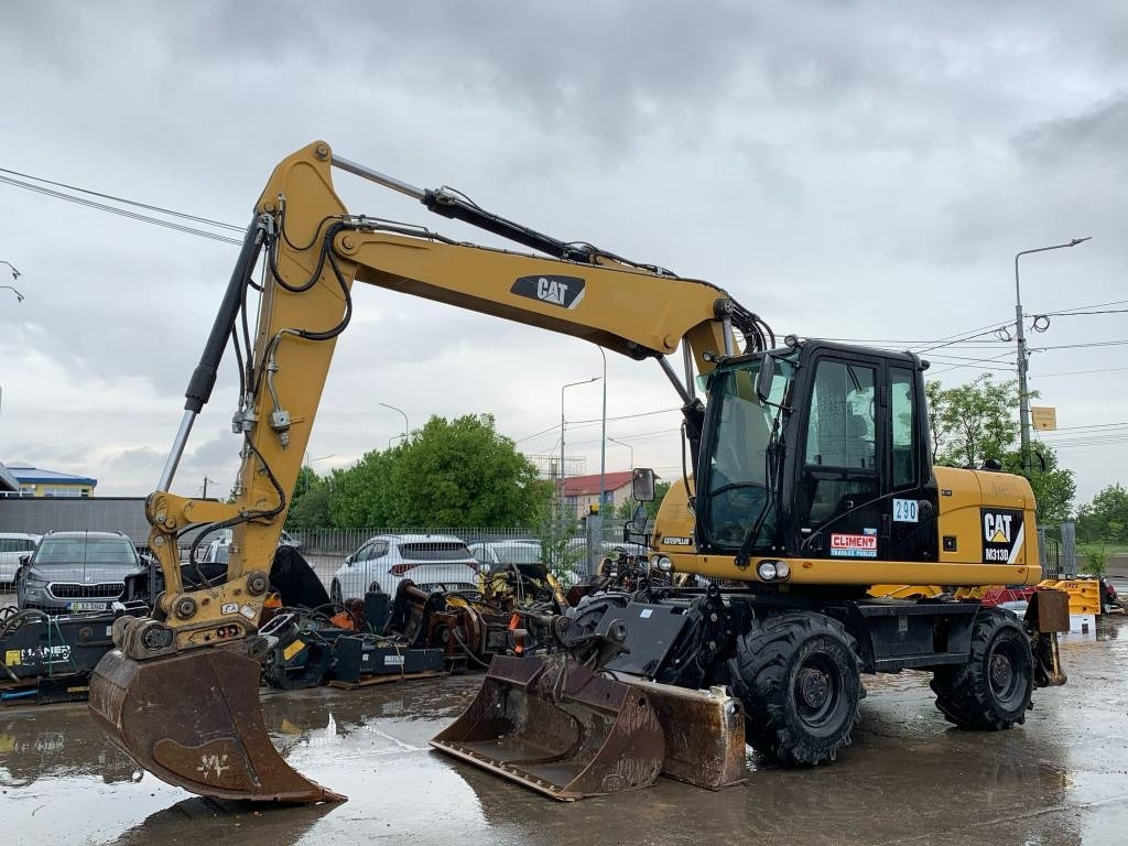 CAT M 313 D - Ratastel ekskavaator: pilt 1 CAT M 313 D - Ratastel ekskavaator: pilt 1