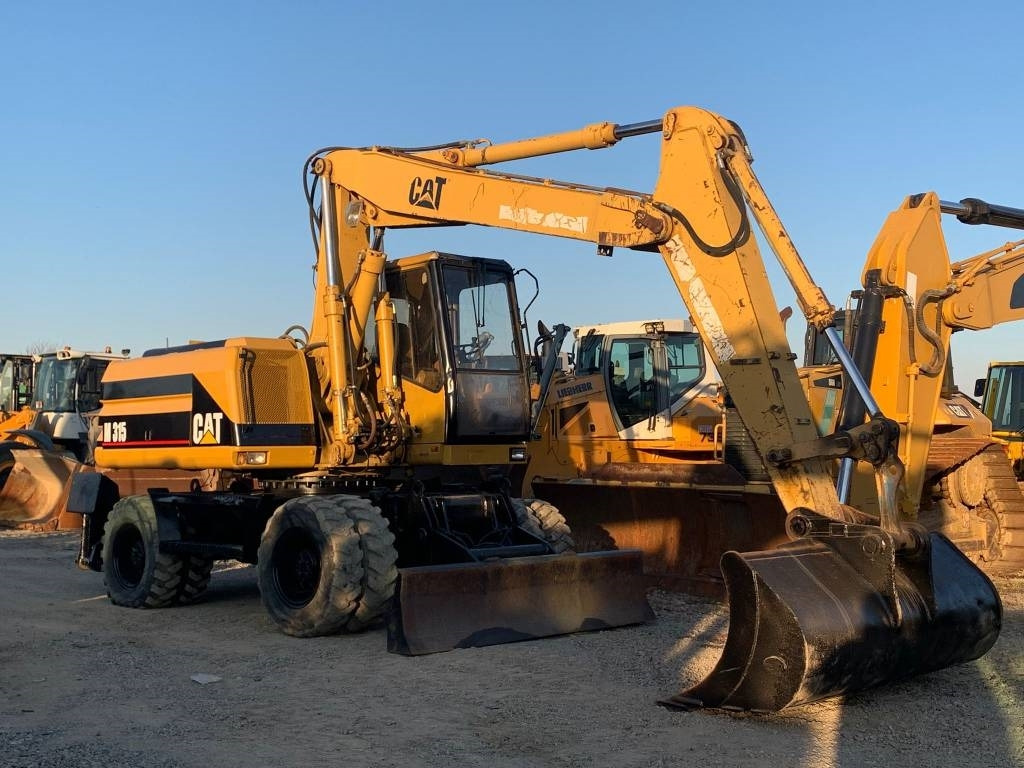 CAT M 315 - Ratastel ekskavaator: pilt 1 CAT M 315 - Ratastel ekskavaator: pilt 1