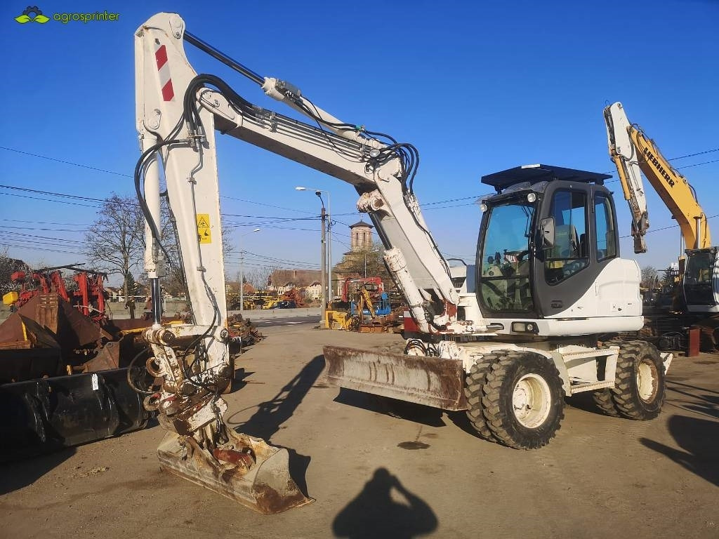 Case WX 125 - Ratastel ekskavaator: pilt 1 Case WX 125 - Ratastel ekskavaator: pilt 1