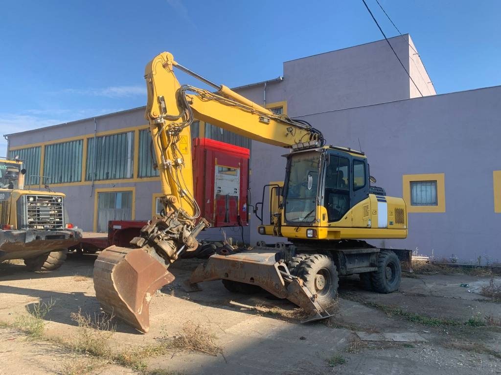 Komatsu PW180-E0+Engcon Rototilt - Ratastel ekskavaator: pilt 1 Komatsu PW180-E0+Engcon Rototilt - Ratastel ekskavaator: pilt 1