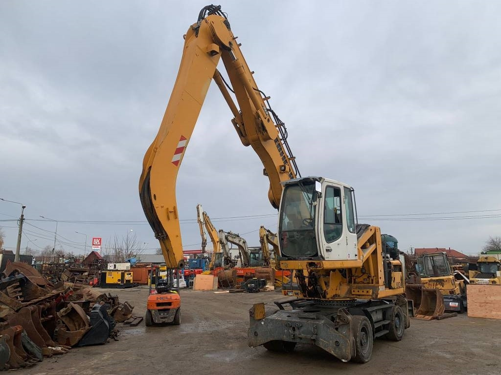 Liebherr A 904 C - Ratastel ekskavaator: pilt 1 Liebherr A 904 C - Ratastel ekskavaator: pilt 1
