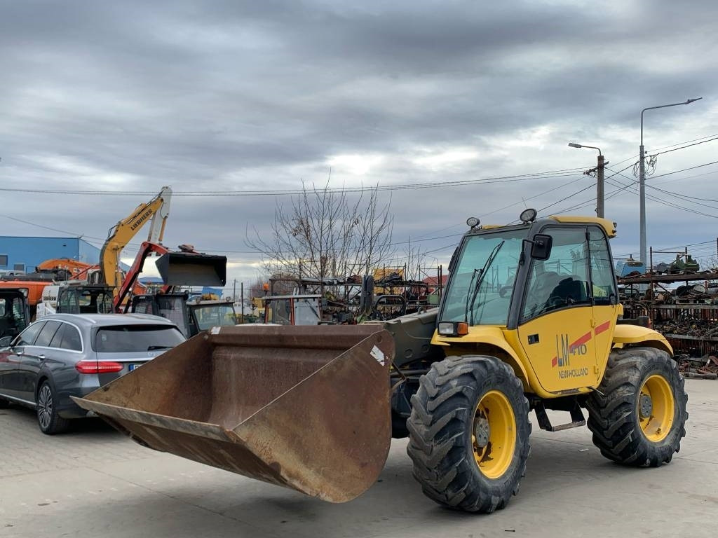 New Holland LM 410 - Teleskooplaadur: pilt 1 New Holland LM 410 - Teleskooplaadur: pilt 1