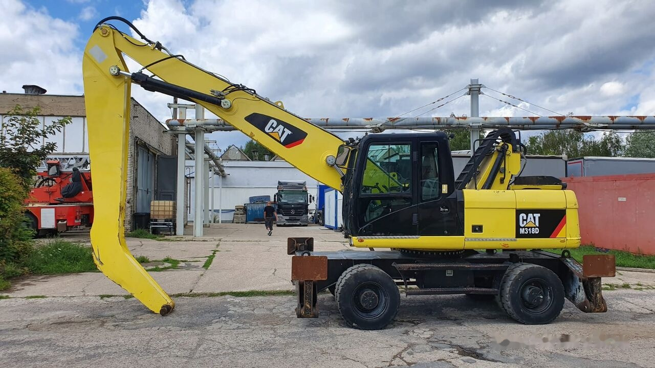 Caterpillar M 318 D MH - Jäätme-/ Tööstuslik käitleja: pilt 1 Caterpillar M 318 D MH - Jäätme-/ Tööstuslik käitleja: pilt 1