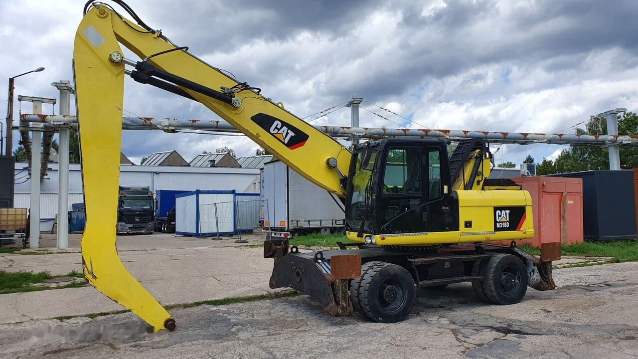 Caterpillar M 318 D MH - Jäätme-/ Tööstuslik käitleja: pilt 2 Caterpillar M 318 D MH - Jäätme-/ Tööstuslik käitleja: pilt 2