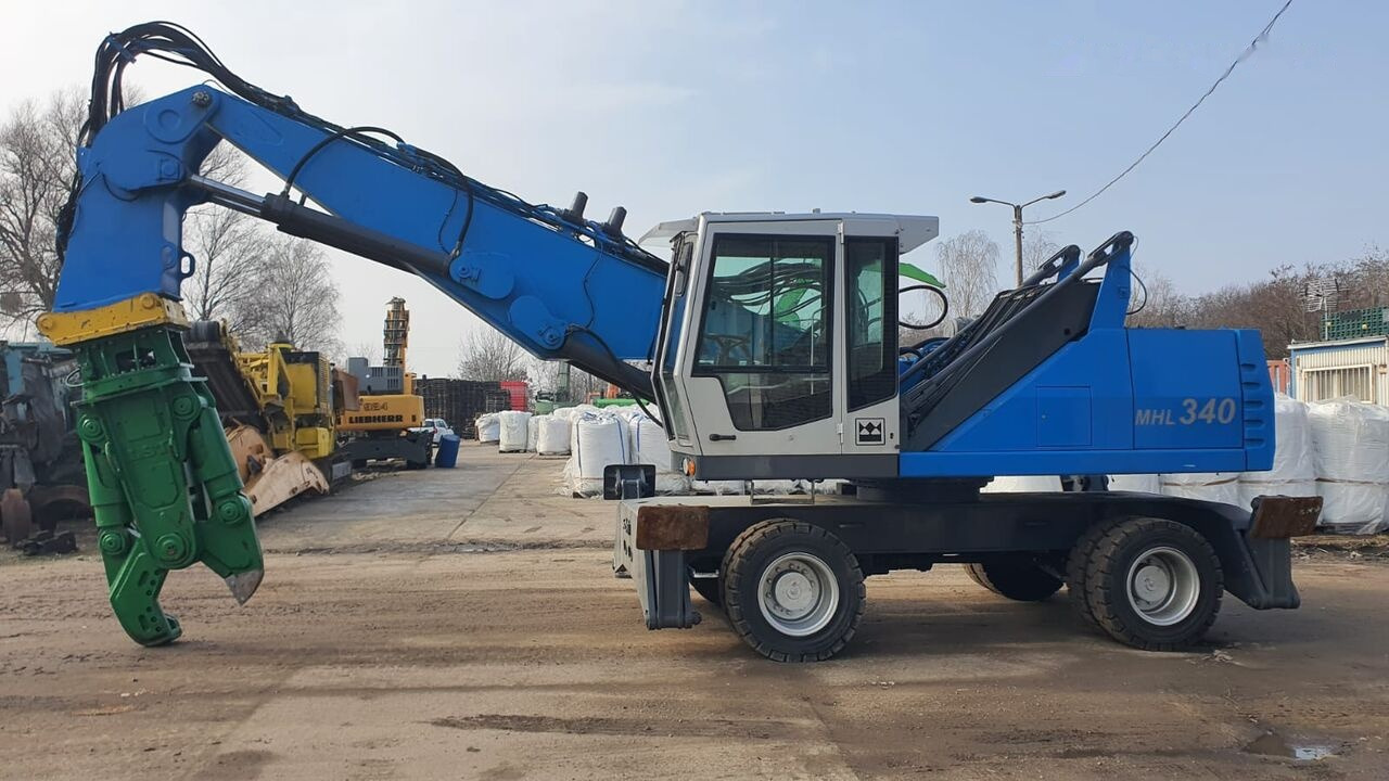 Fuchs MHL 340D FQC + LST 3to shear - Jäätme-/ Tööstuslik käitleja: pilt 1 Fuchs MHL 340D FQC + LST 3to shear - Jäätme-/ Tööstuslik käitleja: pilt 1