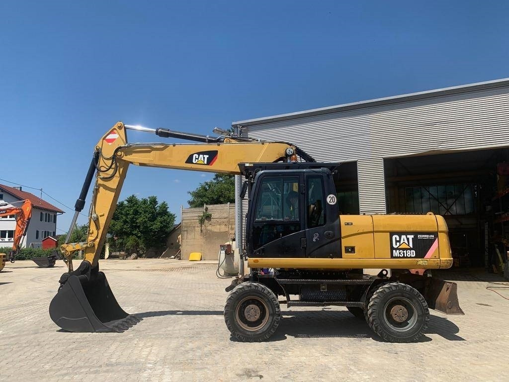 CAT M 318 D - Ratastel ekskavaator: pilt 2 CAT M 318 D - Ratastel ekskavaator: pilt 2