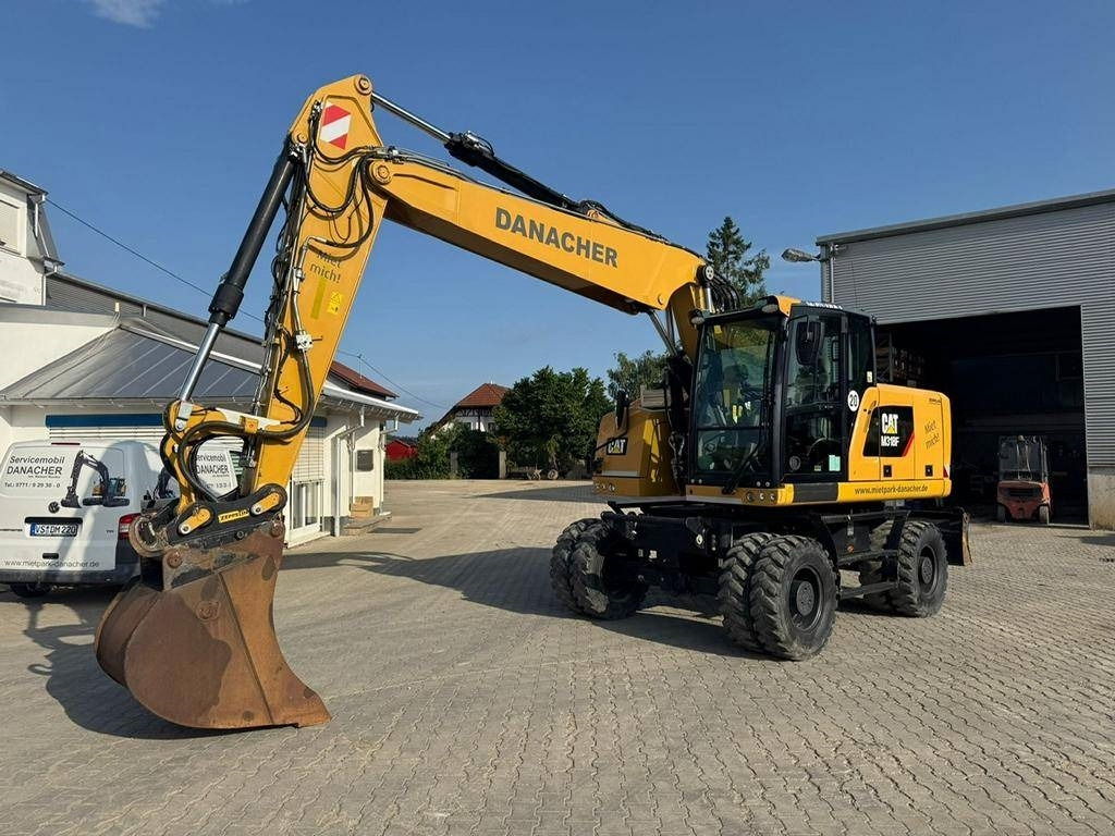 CAT M 318 F - Ratastel ekskavaator: pilt 1 CAT M 318 F - Ratastel ekskavaator: pilt 1