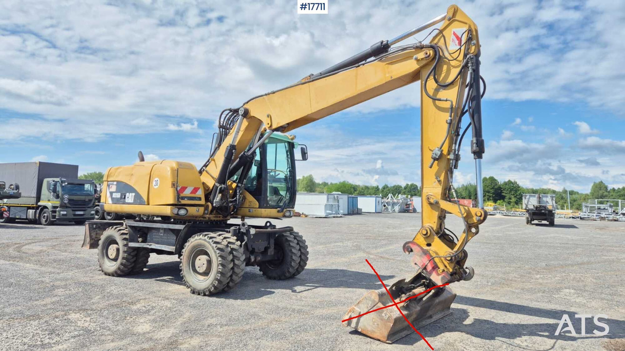 2008 CAT M316D - Ratastel ekskavaator: pilt 1 2008 CAT M316D - Ratastel ekskavaator: pilt 1