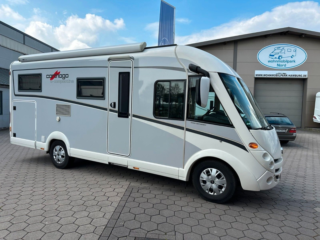 Carthago Compact-Line I 143/1.Hand/Einzelbetten+Hubbett - Täisintegreeritud matkaauto: pilt 2 Carthago Compact-Line I 143/1.Hand/Einzelbetten+Hubbett - Täisintegreeritud matkaauto: pilt 2