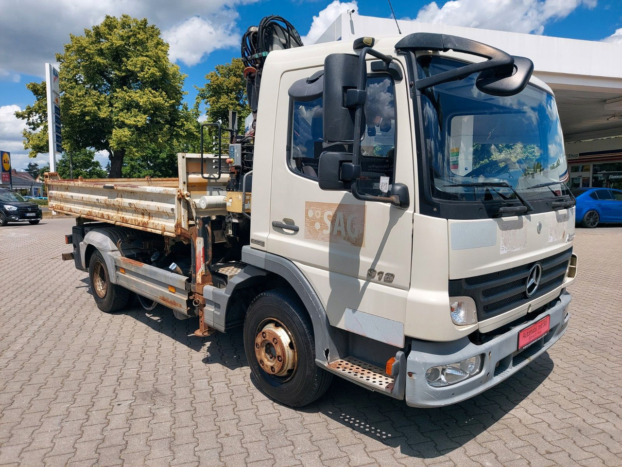 Mercedes-Benz Atego 2 918 3-Seiten Kipper KRAN TEREX 65.2 - Kallurauto, Kraanaga veoauto: pilt 1 Mercedes-Benz Atego 2 918 3-Seiten Kipper KRAN TEREX 65.2 - Kallurauto, Kraanaga veoauto: pilt 1