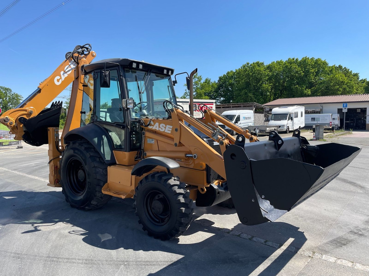 Case 580ST Baggerlader/7597h/72kW/4x4/AC - Ekskavaator-laadur: pilt 1 Case 580ST Baggerlader/7597h/72kW/4x4/AC - Ekskavaator-laadur: pilt 1