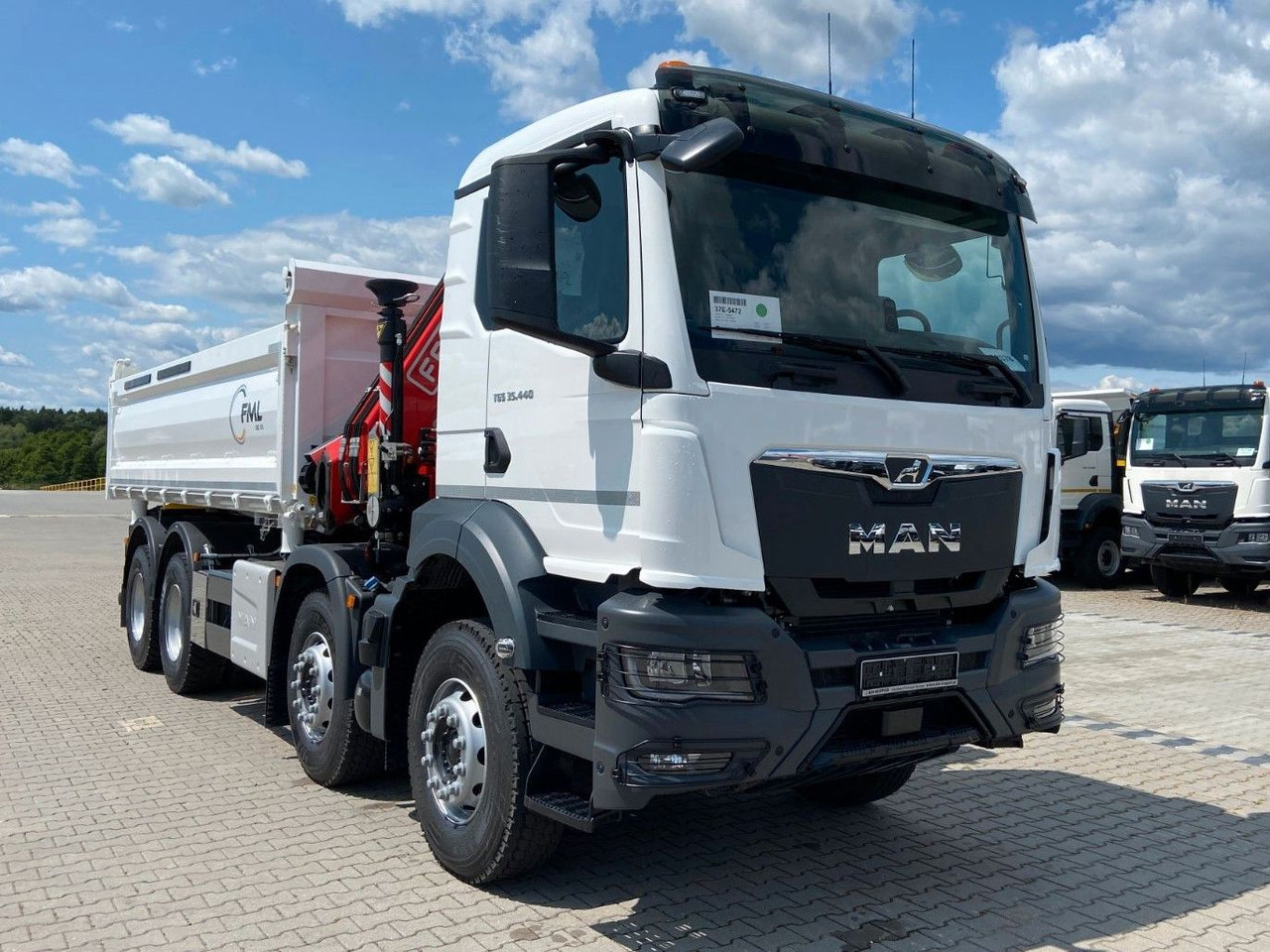 MAN TGS 35.440 DREISEITENKIPPER MIT FASSI F275.026 - Kallurauto, Kraanaga veoauto: pilt 2 MAN TGS 35.440 DREISEITENKIPPER MIT FASSI F275.026 - Kallurauto, Kraanaga veoauto: pilt 2