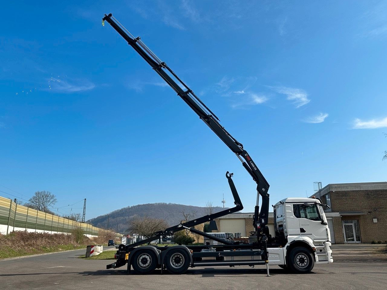 MAN TGS 26.470 6x2 Abrollkipper + Kran Hiab 228-4 - Konkstõstukiga veoauto, Kraanaga veoauto: pilt 4 MAN TGS 26.470 6x2 Abrollkipper + Kran Hiab 228-4 - Konkstõstukiga veoauto, Kraanaga veoauto: pilt 4