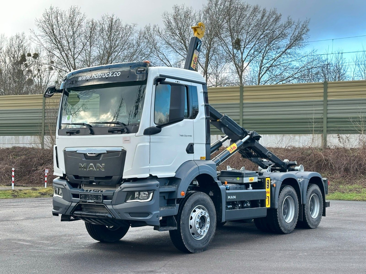 MAN TGS 33.440 6x4 Euro6e Abrollkipper Hyva - Konkstõstukiga veoauto, Kraanaga veoauto: pilt 1 MAN TGS 33.440 6x4 Euro6e Abrollkipper Hyva - Konkstõstukiga veoauto, Kraanaga veoauto: pilt 1
