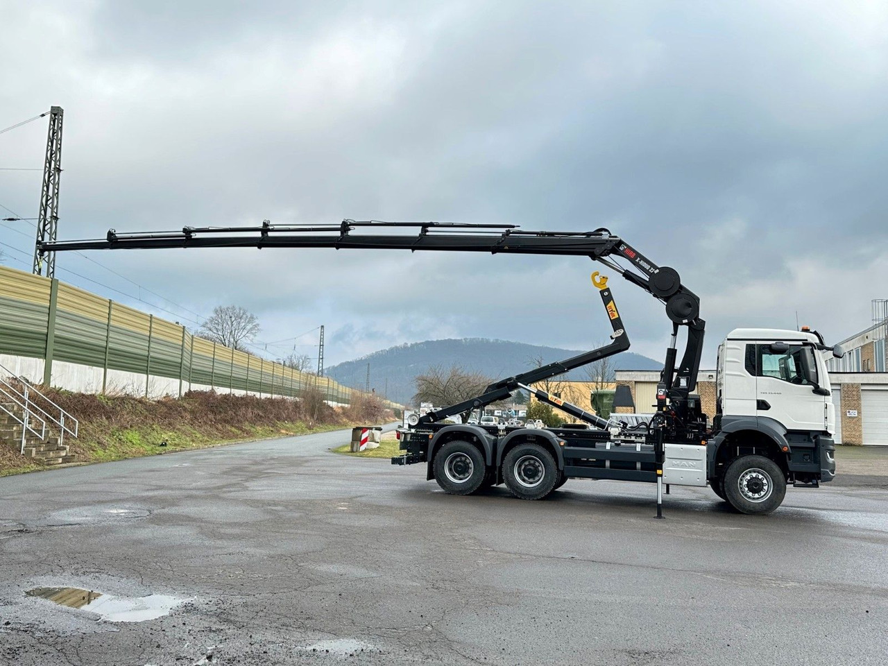 MAN TGS 33.440 6x6 BB Abrollkipper+Kran Hiab 228-6 - Konkstõstukiga veoauto, Kraanaga veoauto: pilt 4 MAN TGS 33.440 6x6 BB Abrollkipper+Kran Hiab 228-6 - Konkstõstukiga veoauto, Kraanaga veoauto: pilt 4
