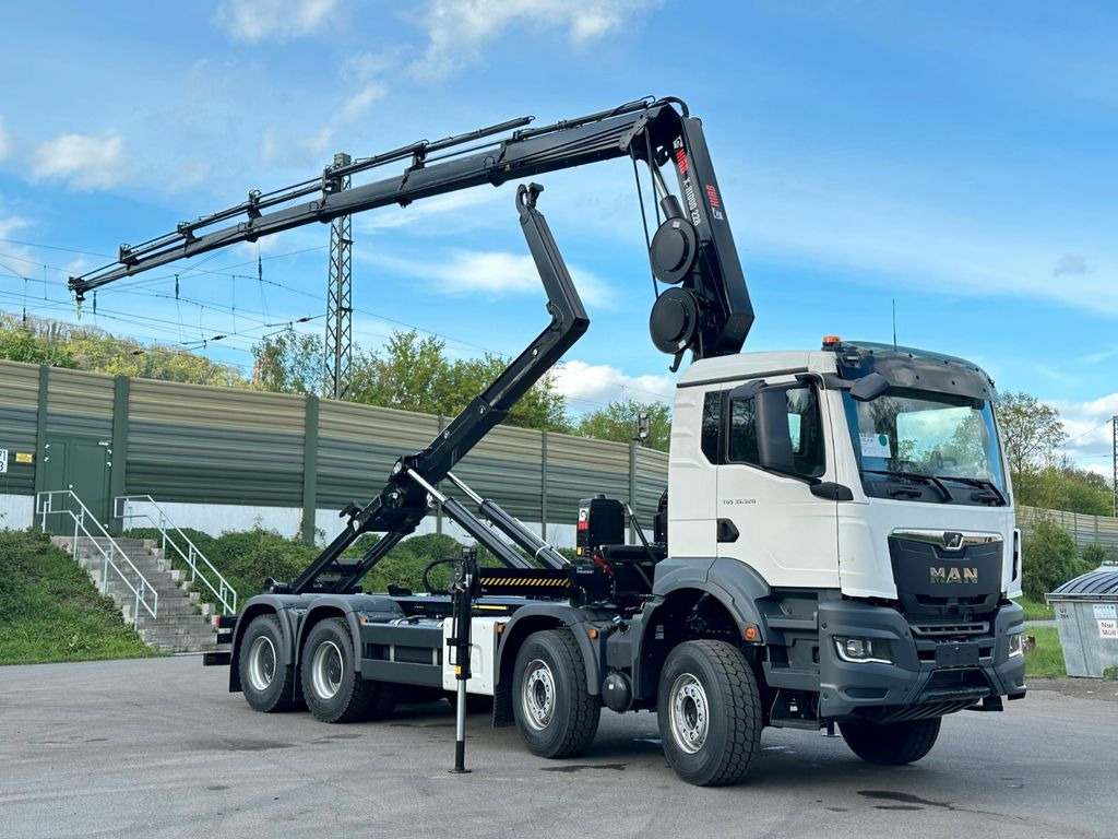 MAN TGS 35.520 8x4 Abrollkipper + Kran HIAB 228-6 - Konkstõstukiga veoauto, Kraanaga veoauto: pilt 1 MAN TGS 35.520 8x4 Abrollkipper + Kran HIAB 228-6 - Konkstõstukiga veoauto, Kraanaga veoauto: pilt 1