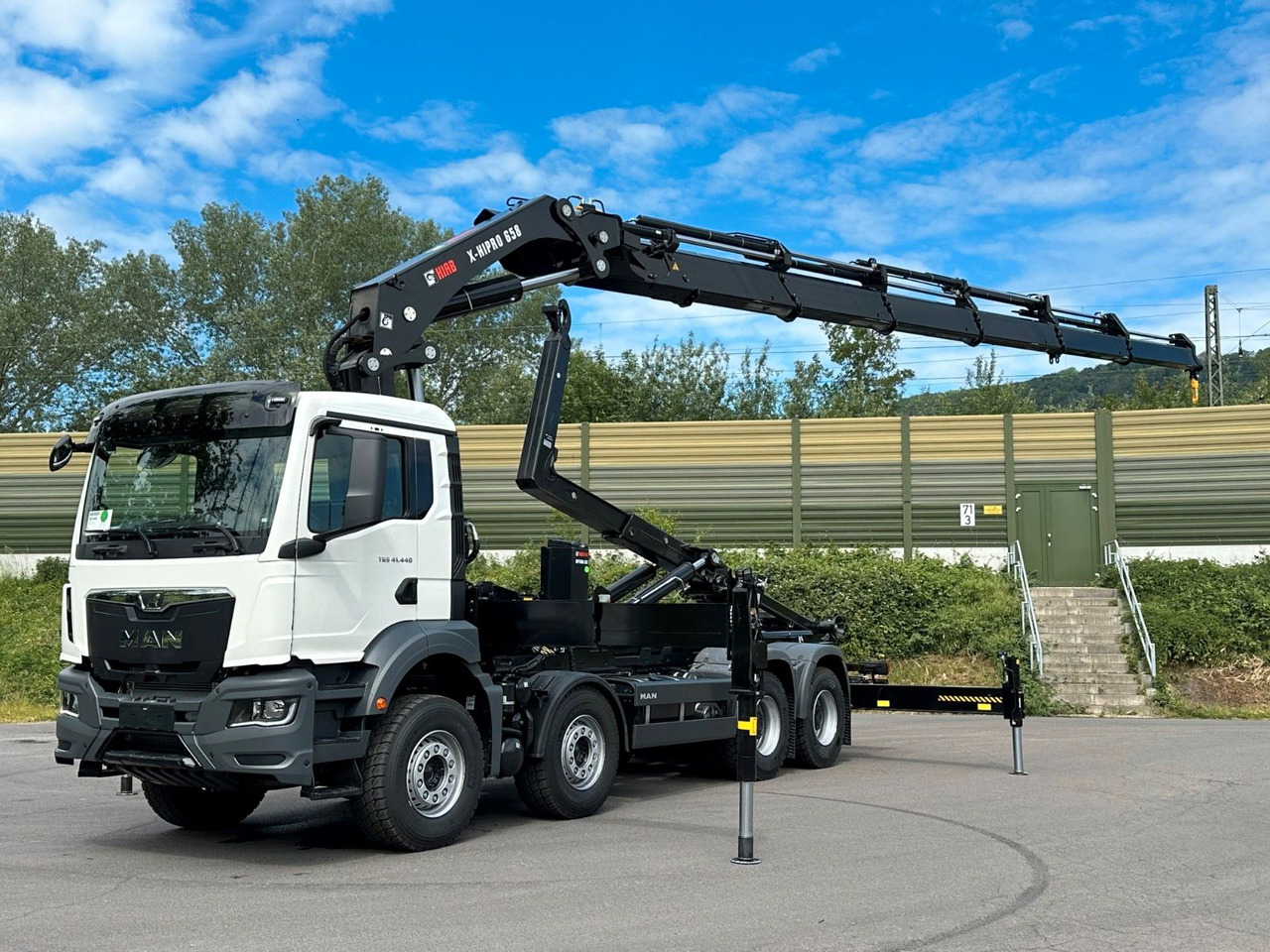 MAN TGS 35.520 8x4 Abrollkipper + Kran HIAB 658E6 - Konkstõstukiga veoauto, Kraanaga veoauto: pilt 1 MAN TGS 35.520 8x4 Abrollkipper + Kran HIAB 658E6 - Konkstõstukiga veoauto, Kraanaga veoauto: pilt 1