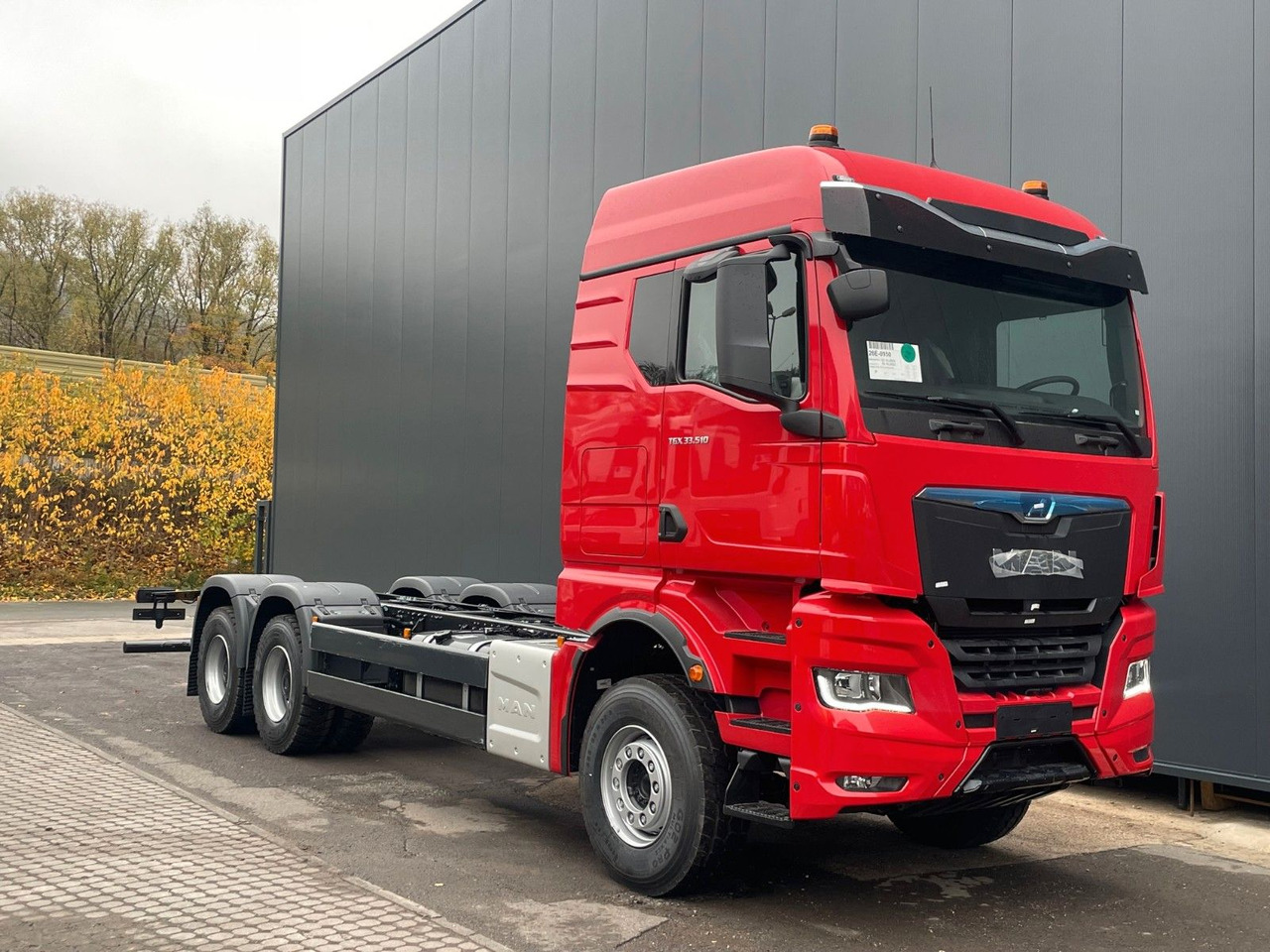 MAN TGX 33.510 6X4 BL - Kabiinišassiiga veoauto: pilt 1 MAN TGX 33.510 6X4 BL - Kabiinišassiiga veoauto: pilt 1