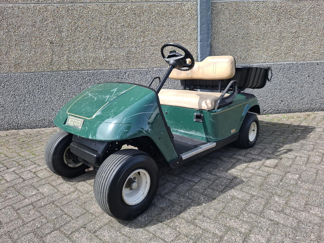 E-Z-GO TXT 2-Persoons Elektrische Golfkar met Open Laadbak 1442482 - Golfiauto: pilt 1 E-Z-GO TXT 2-Persoons Elektrische Golfkar met Open Laadbak 1442482 - Golfiauto: pilt 1