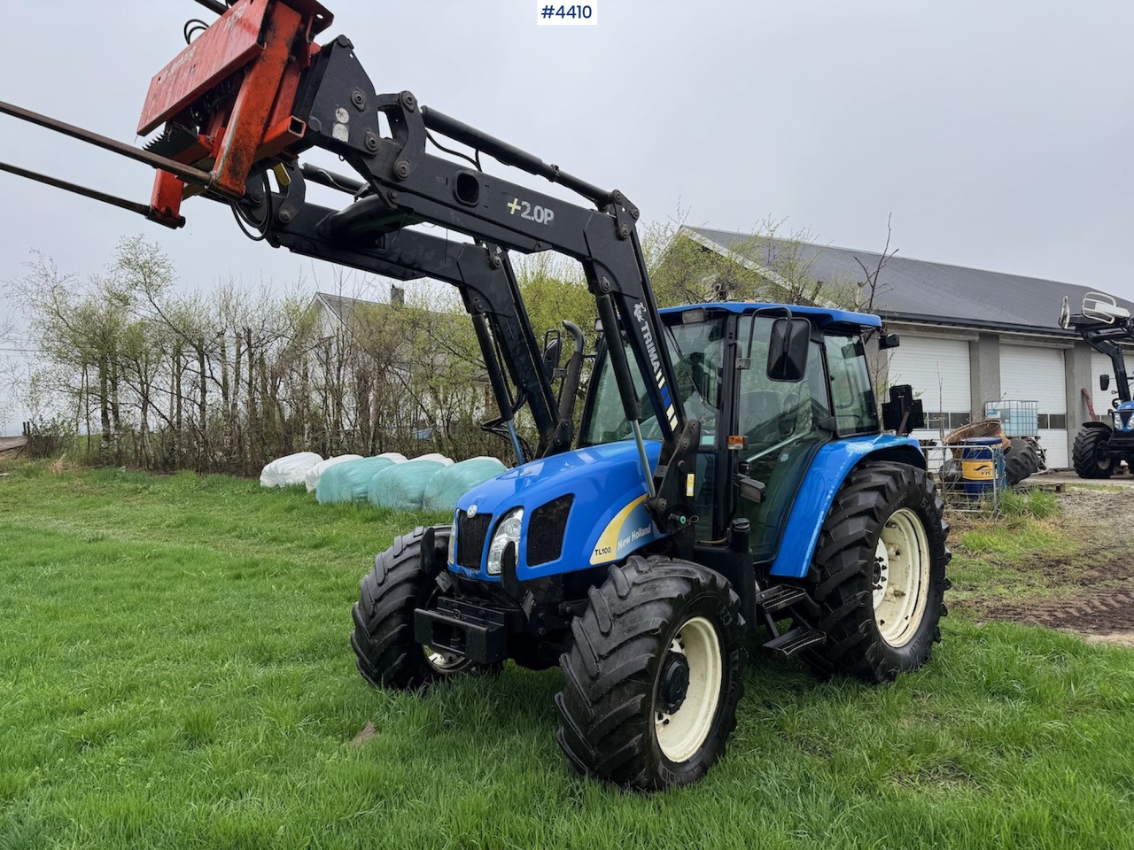 2006 New Holland TL100 A w/Front Loader. - Traktor: pilt 1 2006 New Holland TL100 A w/Front Loader. - Traktor: pilt 1