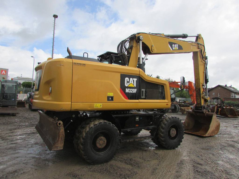 Cat M 320 F Mobilbagger 69.500 EUR / AC - Ratastel ekskavaator: pilt 5 Cat M 320 F Mobilbagger 69.500 EUR / AC - Ratastel ekskavaator: pilt 5