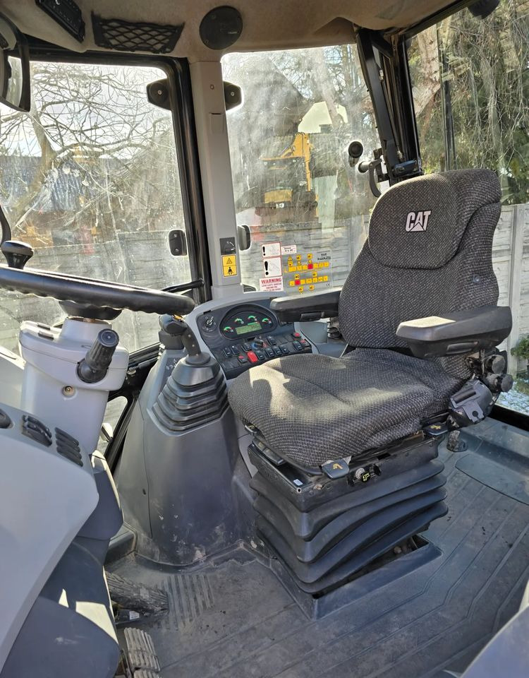Caterpillar - Ekskavaator-laadur: pilt 4 Caterpillar - Ekskavaator-laadur: pilt 4