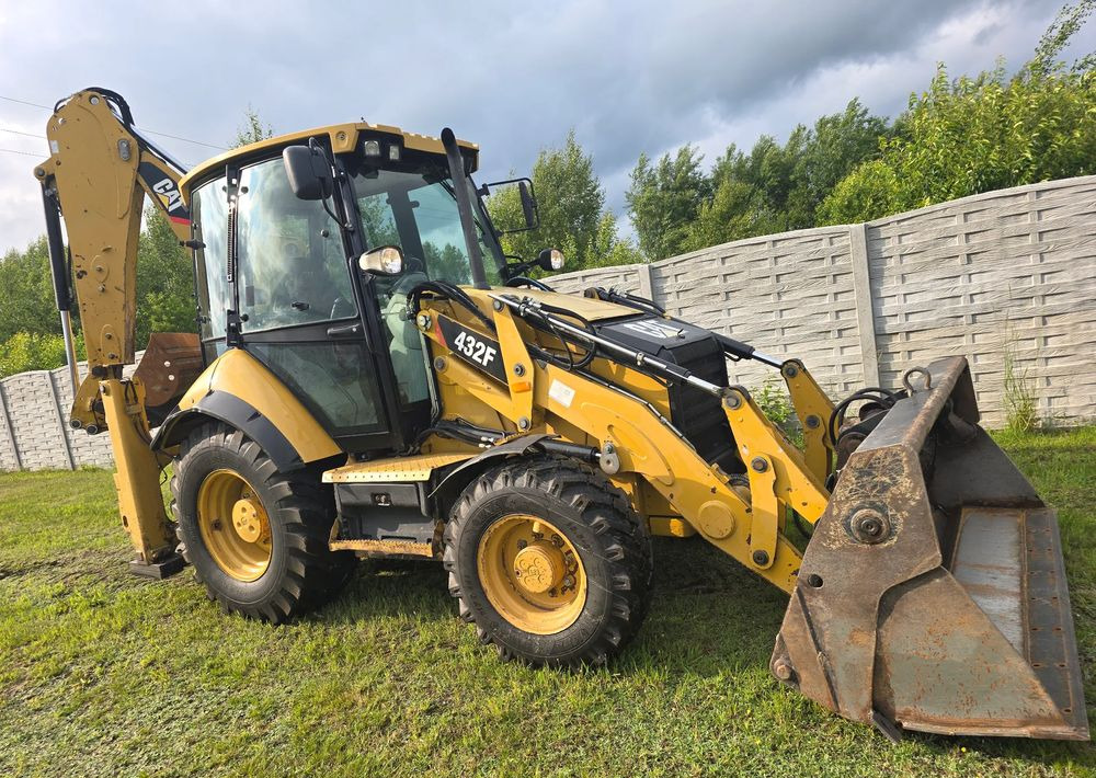 Caterpillar - Ekskavaator-laadur: pilt 2 Caterpillar - Ekskavaator-laadur: pilt 2